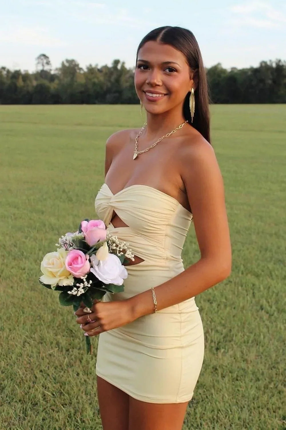 Elegant Strapless Yellow Ruched Bodycon Homecoming Dress with Cutout Detail